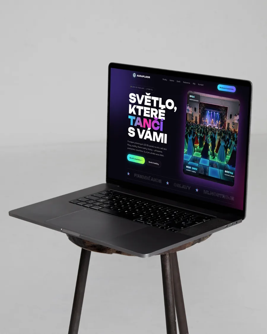 The AuraFloor website shown on a laptop